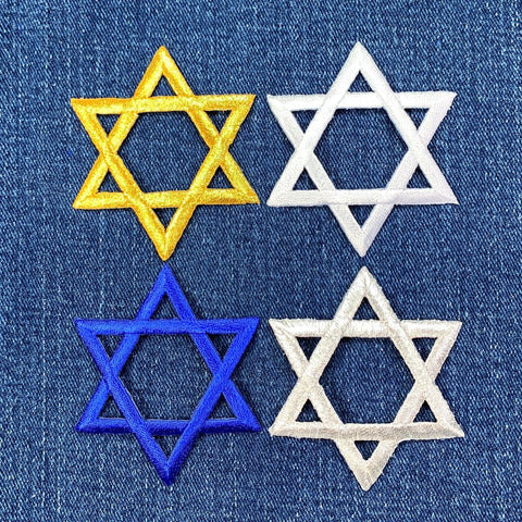 Four embroidered Star of David patches in gold, white, blue, and silver on denim fabric.
