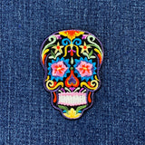 sugar skull patch on a denim background