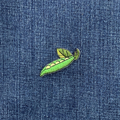 sweet peas patch on a denim background