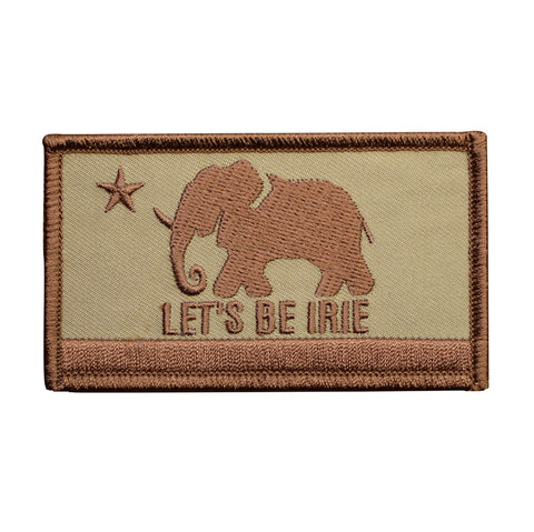 An embroidered rectangular patch featuring a tan elephant and star on a beige background with the text 'LET'S BE IRIE' and a brown border.