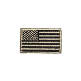 Tan and black American flag patch on a white background