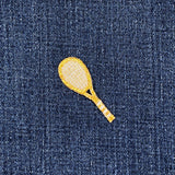 Tennis Racket Patch on a denim background