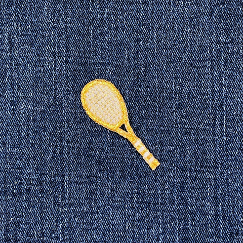 Tennis Racket Patch on a denim background