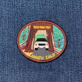Klamath California tour thru tree souvenir patch on a denim background