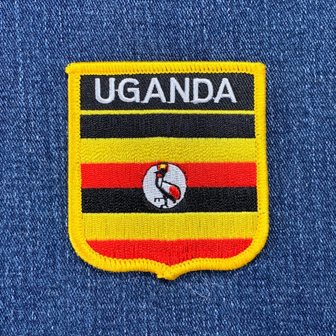 Uganda flag patch on a blue denim background