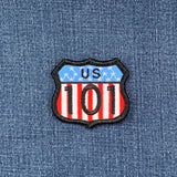 Patch with American Flag US Route 101 design on a denim background