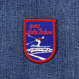 Embroidered patch on denim fabric with 'Ski Lake Tahoe' design