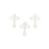 3 White cross-shaped patches on a blue white background