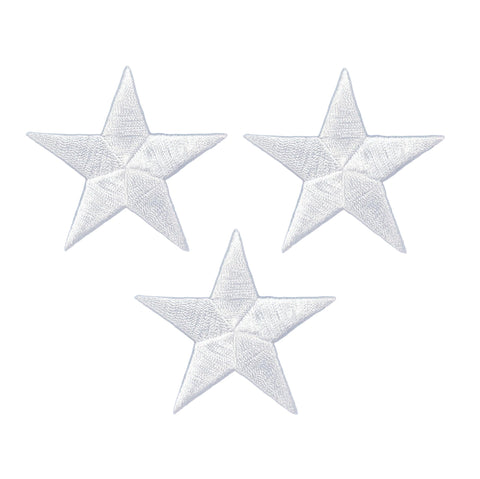 three white star patches on a white background