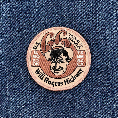 Patch with Will Rogers' face and text on a blue denim background