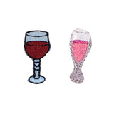 Two wine-themed patches, one resembling a red wine glass and the other a champagne flute, on a white background.