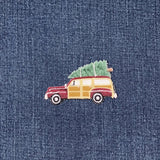 Embroidered vintage car patch with a Christmas tree on denim fabric