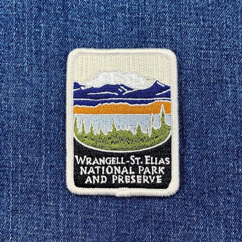 Embroidered patch of Wrangell-St. Elias National Park and Preserve on denim fabric.