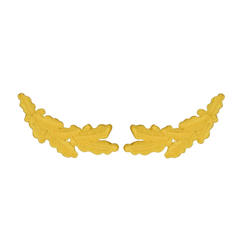 Yellow oak leaf embroidered patches also known as scrambled eggs, on a white background