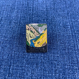 Yellowstone National Park pin on a blue denim background
