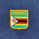 Zimbabwe Patch - Embroidered Flag Shield Badge 2.75" (Iron On)