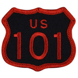 A red and black embroidered patch shaped like a shield with the text 'USA 101' in the center.