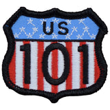 A shield-shaped patch with a USA flag blue, red, and white color scheme, featuring the text 'USA 101' 