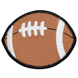 An embroidered patch in the shape of a football, designed with brown, white, and black colors, with a textured appearance.