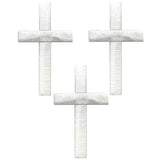 three white cross patches on a white background