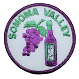 A round embroidered patch with the text 'SONOMA VALLEY' featuring an illustration of grapes and a wine bottle.