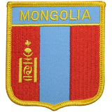 A rectangular embroidered patch with a red background, featuring a blue and yellow stripe at the top, and a yellow depiction of a traditional Mongolian hat and staff symbol in the center.