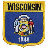 A shield-shaped embroidered patch with the Wisconsin state flag, featuring an emblem with a person, a sheaf of wheat, and the date 1848, surrounded by a blue border with the word 'WISCONSIN' across the top.
