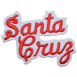 An embroidered patch with the text 'Santa Cruz' in red