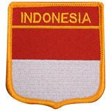 A shield-shaped patch with the text 'INDONESIA' on it, featuring a red and white color scheme with a yellow border.