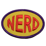 An oval-shaped embroidered patch with the word 'NERD' in bold red letters on a yellow background, framed by a purple border.