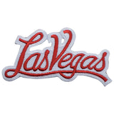 A 4-inch wide embroidered patch with 'Las Vegas' written in a cursive script, primarily red with a white fill and a silver outline.