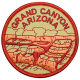 A round embroidered patch with the text 'GRAND CANYON ARIZONA' and an illustration of the Colorado River.