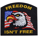 A patch featuring an eagle with a American flag in the background, with the text 'FREEDOM ISN'T FREE' on it.