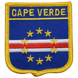 A shield-shaped embroidered patch with the text 'CAPE VERDE' on it, featuring a blue background with yellow and red horizontal stripes and gold stars.