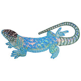 Embroidered lizard patch featuring a speckled black and white head, a bright blue iridescent body, and a curved, striped tail.