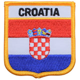 A shield-shaped embroidered patch with the text 'CROATIA' at the top, featuring the Croatian national flag colors and the coat of arms, bordered by a yellow edge.
