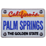 An embroidered patch designed to resemble a California license plate with 'Palm Springs' and 'The Golden State' text.