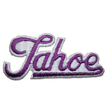 A vintage embroidered patch with 'TAHOE' text in purple and white colors on a white background.