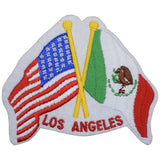 A patch featuring crossed American and Mexican flags with the text 'LOS ANGELES' below them. The patch is designed for iron-on application.