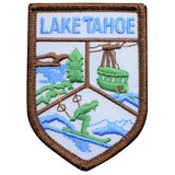 Embroidered patch depicting a ski scene with 'LAKE TAHOE' text, a ski lift, trees, and a body of water.