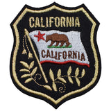 A shield-shaped patch featuring the California flag with a grizzly bear on it, predominantly gold, black, and red colors.