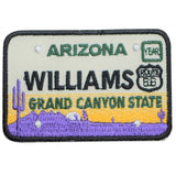 A rectangular patch featuring text and imagery related to Williams, Arizona and the Grand Canyon. It has a section resembling a license plate with 'Arizona' and 'Route 66' text.