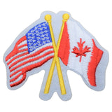 A patch featuring the crossed flags of the United States of America and Canada with an iron on backing.