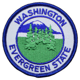 A round embroidered patch with the text 'Washington Evergreen State' and a depiction of trees and a Mount Rainier in the background, framed by a blue border.