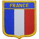 A shield-shaped embroidered patch featuring the flag of France with the word 'France' written above it.
