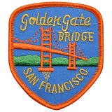 A shield-shaped patch featuring the Golden Gate Bridge with the text 'San Francisco' at the bottom, predominantly in blue and orange colors.