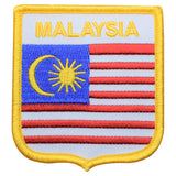 An embroidered patch featuring the flag of Malaysia with the text 'MALAYSIA' on top, in a shield shape with a yellow border.