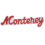 A vintage Monterey patch featuring the text 'Monterey' in red script on a white background, designed to be ironed onto fabric.