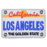 A patch with a design resembling a California license plate, featuring the text 'Los Angeles - The Golden State' with a red and orange sun motif.