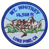 A round patch featuring an illustration of a mountain range with the text 'Mt. Whitney 14,508 ft. Lone Pine, CA'